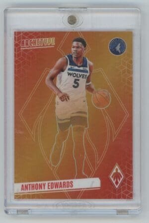 The 2023 Panini Phoenix Archetype #2 card features Anthony Edwards in a white Wolves jersey holding a basketball, set against an orange-red background with his name displayed at the bottom.