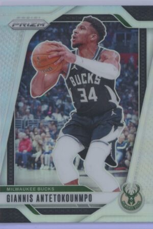 A basketball trading card featuring Giannis Antetokounmpo of the Milwaukee Bucks in a black uniform, holding a basketball mid-action. The card displays his name and the Bucks logo at the bottom.