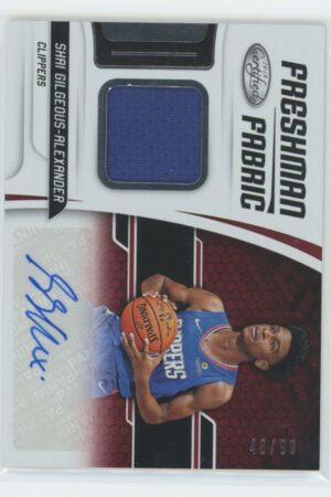 Basketball trading card featuring Shai Gilgeous-Alexander in a blue Clippers jersey, with a blue fabric swatch, autograph, and serial number 48/99. The card is labeled Freshman Fabric.