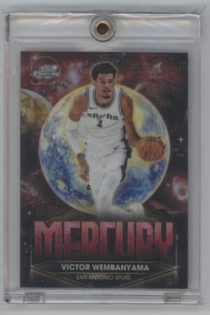 Victor Wembanyama in a Spurs uniform dribbling a basketball, featured on a trading card with a cosmic background and the word MERCURY in bold red letters at the bottom.