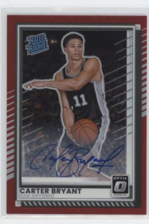 A basketball trading card titled Rated Rookie features Carter Bryant in a San Antonio jersey, dribbling a basketball. The card has a red border and includes his autograph in blue ink.